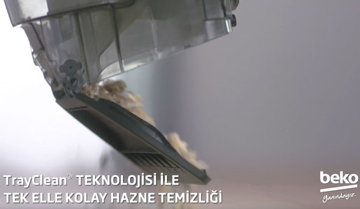 Visuel pr�sentant la vidange du collecteur � poussi�res d'un aspirateur avec TrayClean