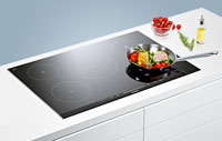 Photo d'une table de cuisson à induction - (crédit : Siemens) Illustration d'une table de cuisson Siemens
