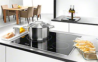 Visuel d'une table de cuisson à induction - (crédit : Miele) Illustration d'une table de cuisson