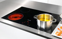 Illustration d'une table de cuisson vitrocéramique - (crédit : Miele) Visuel d'une table de cuisson vitrocéramique