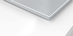 Illustration d'une table de cuisson avec un revêtement en Inox - (crédit : Siemens) Table de cuisson avec revêtement inox