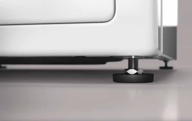 Image pr�sentant l'ajustement de la hauteur des pieds d'une machine � laver