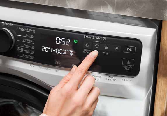 Illustration de la programmation d'un lave-linge pour sa premi�re utilisation