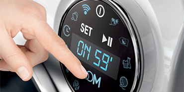 Le bouton tactile Smart Ring des lave-linge Bianca simplifie l'utilisation Visuel illustrant l'activation de la fonction Zoom sur le bouton Smart Ring des lave-linge Bianca